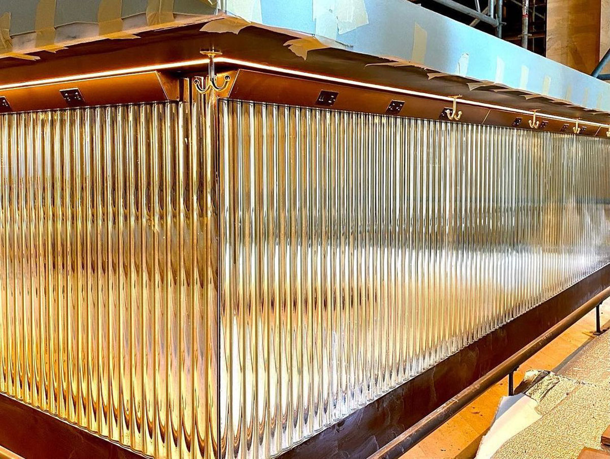 Bar Fluted Glass Close Torques decorative glass partition for Cache Creek Casino by Nathan Allan Glass Studios