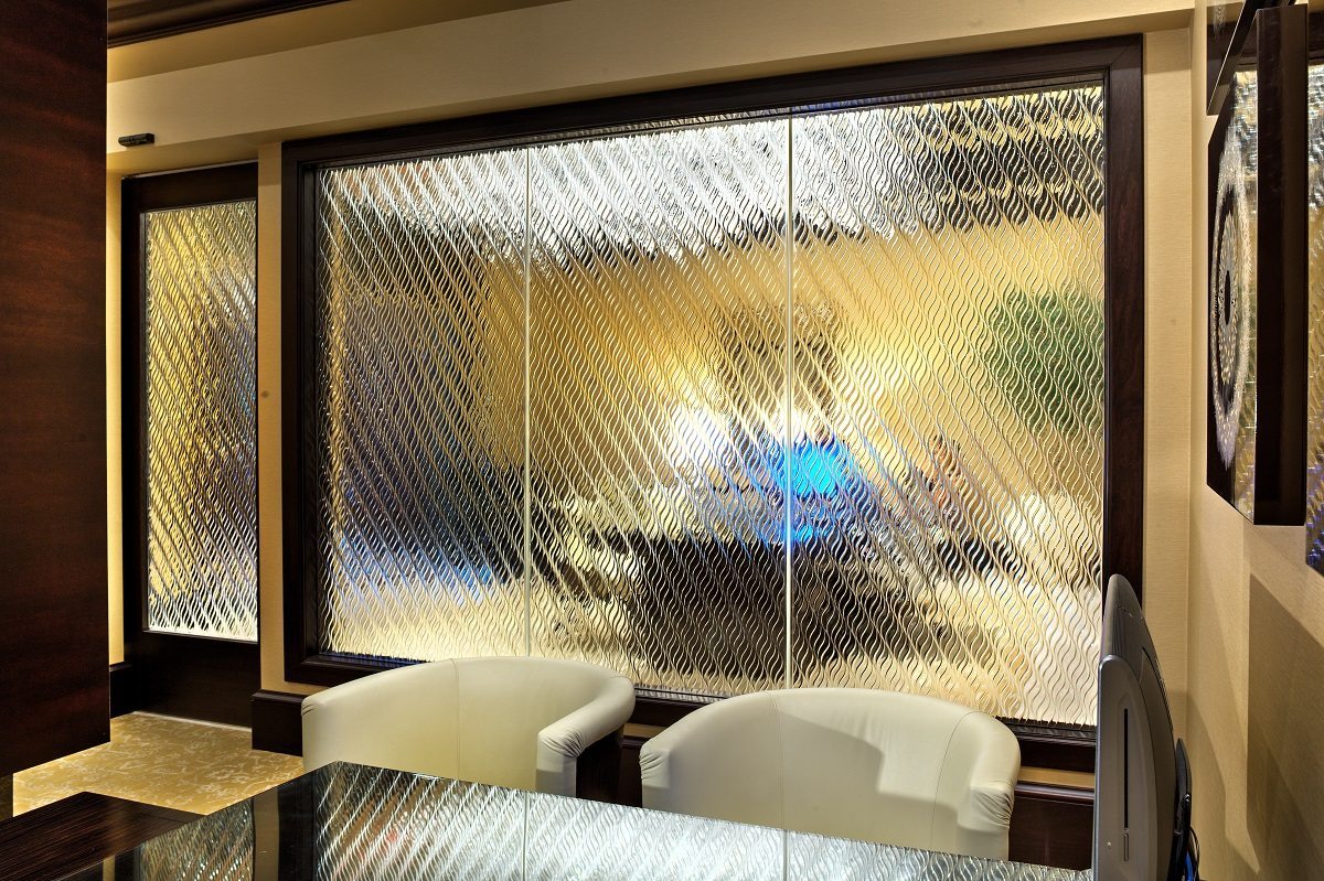 Torques decorative glass partition for Cache Creek Casino by Nathan Allan Glass Studios