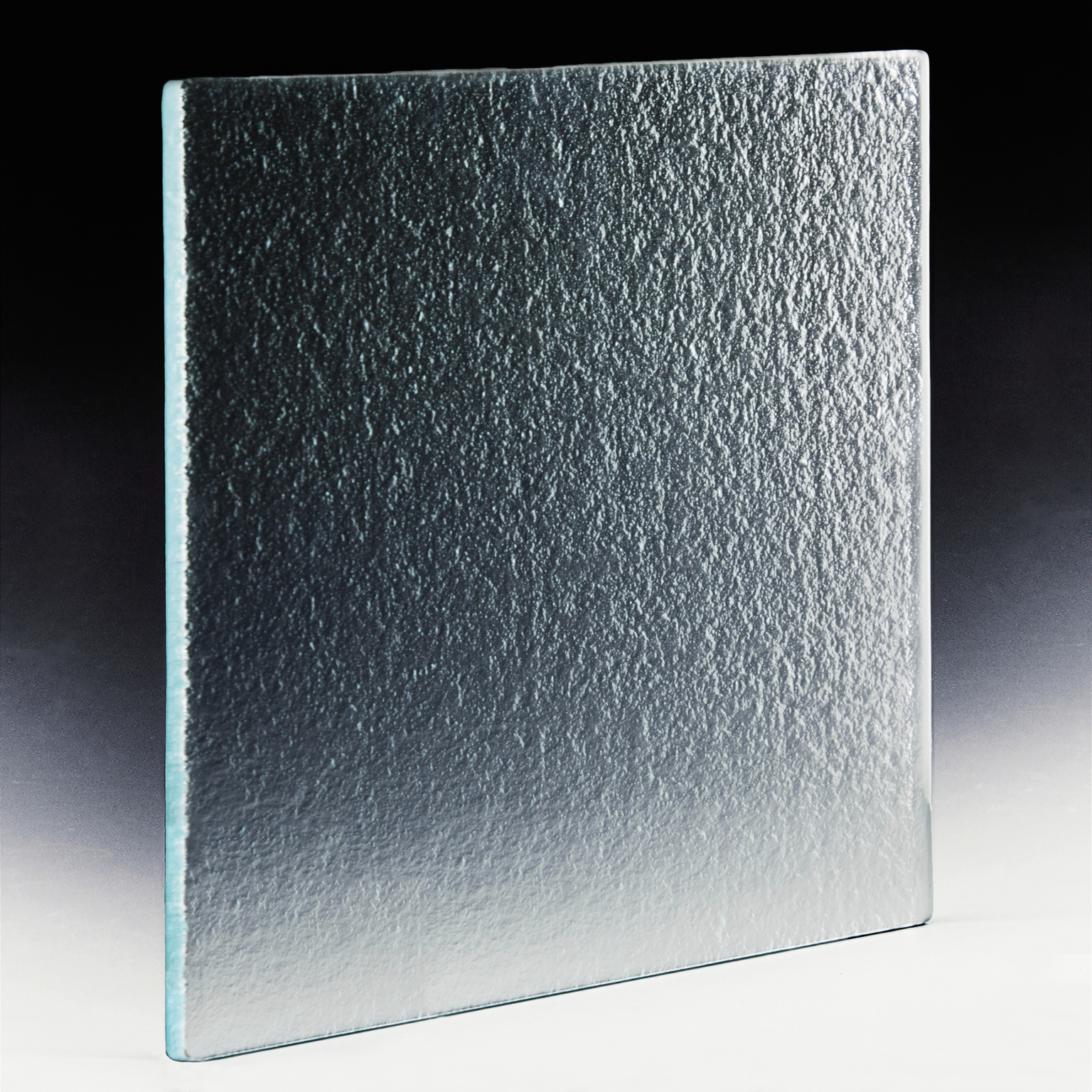 Sandstone textured glass flooring system is a hand crafted organic glass